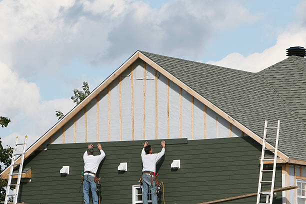 Professional Wood Siding technician working in Corning, NY